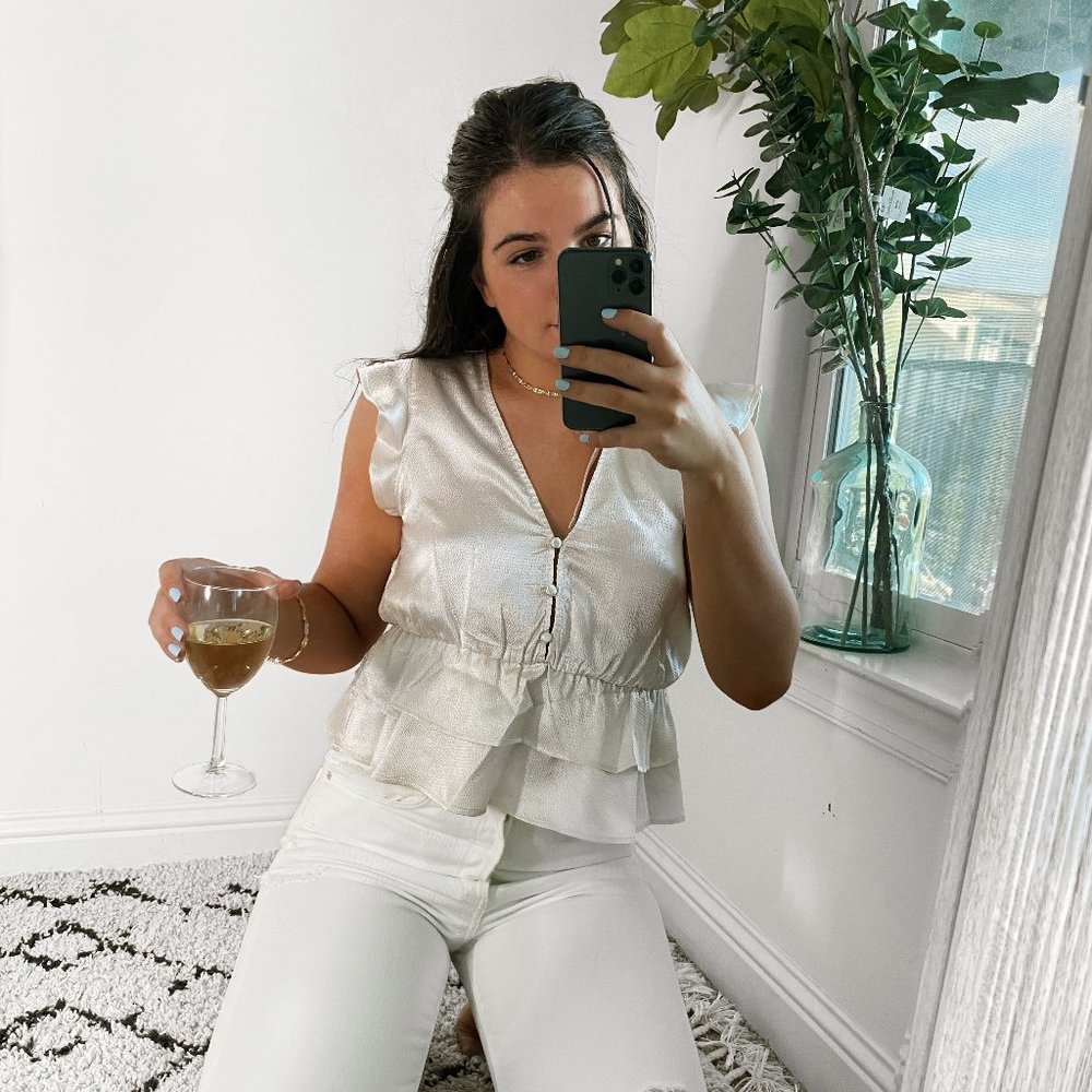 Sleeveless Metallic Ivory Ruffle Peplum Blouse